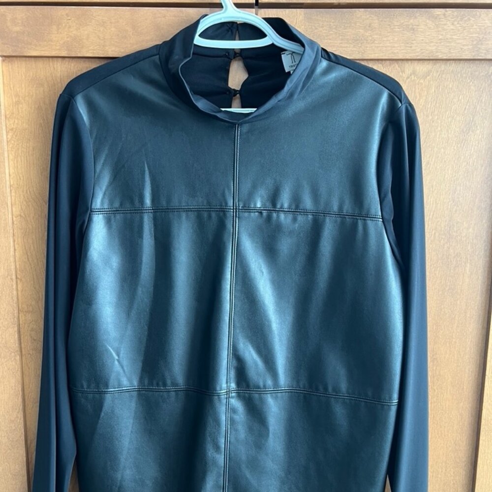 Leather (faux) sweater in the front